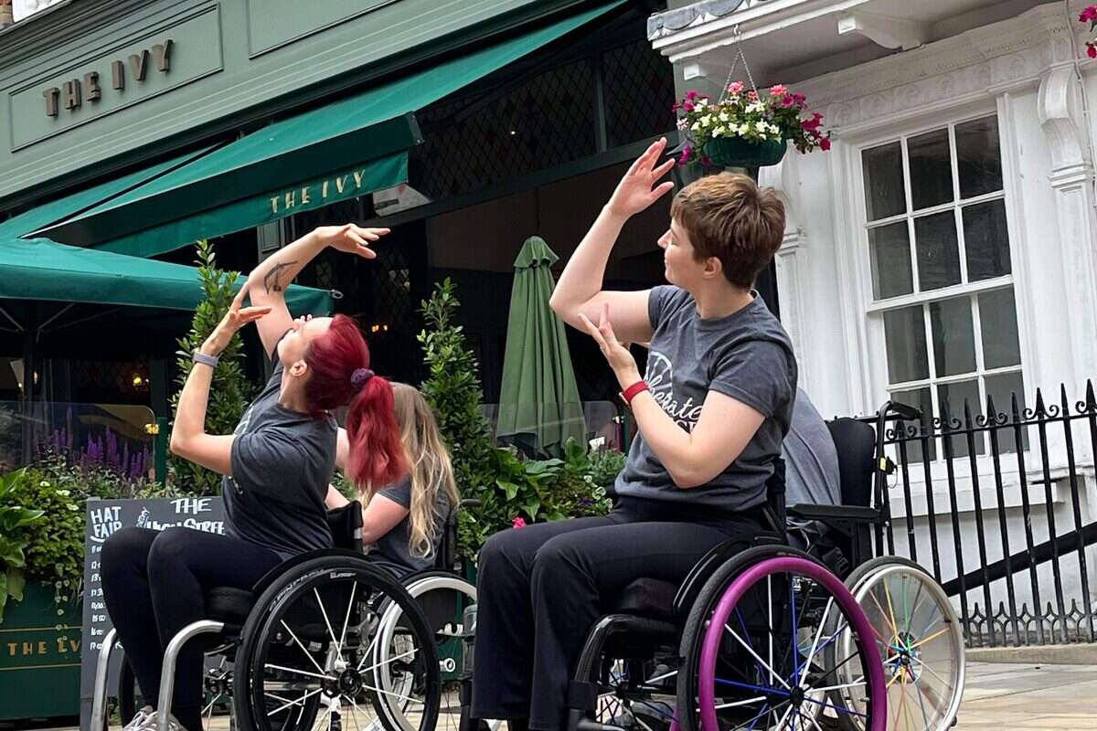 Liberate Dance performers dancing outdoors in the community